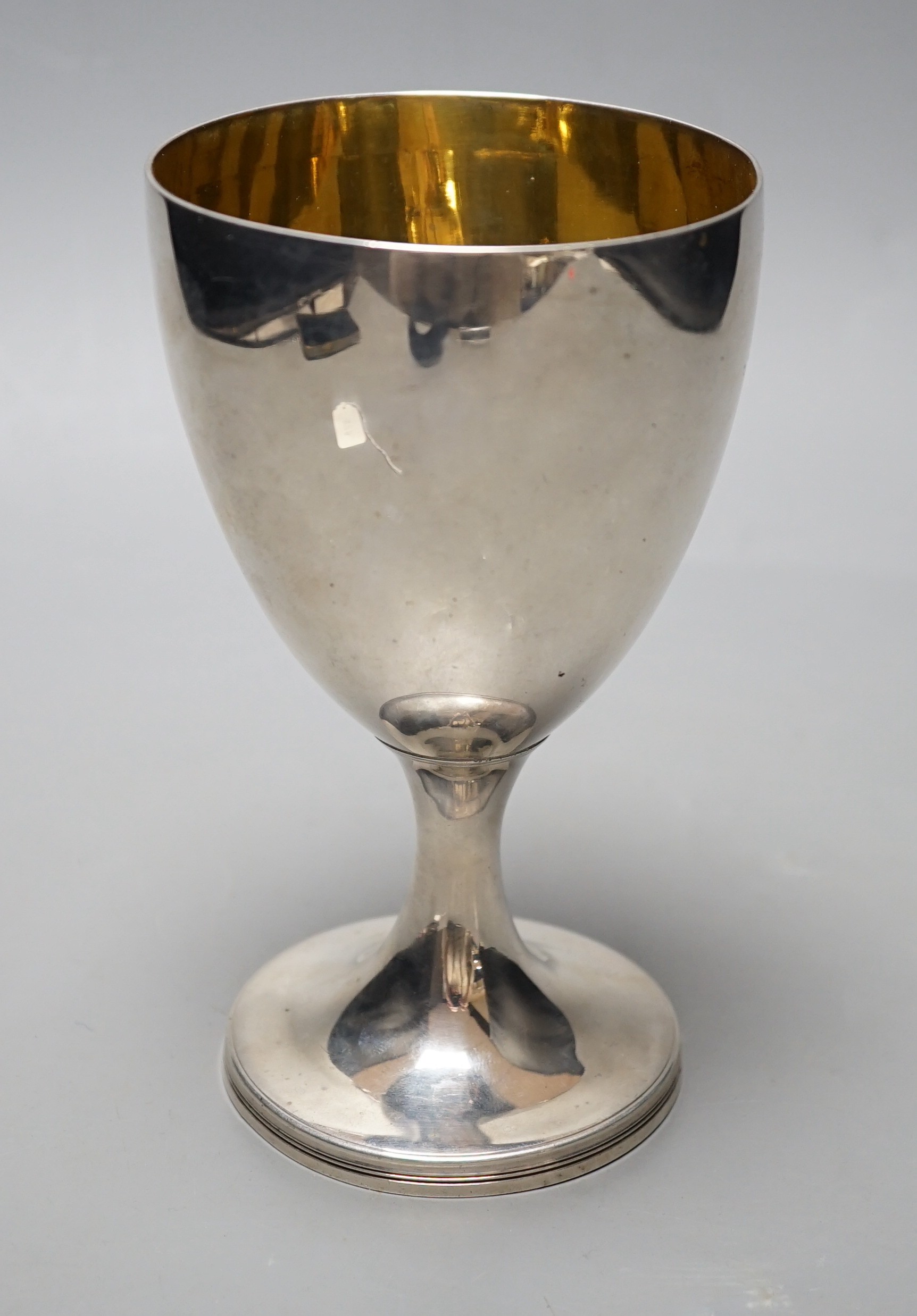 A George III silver goblet, by James Mince, London, 1792, with engraved crest, height 15.5cm, 7.6oz.